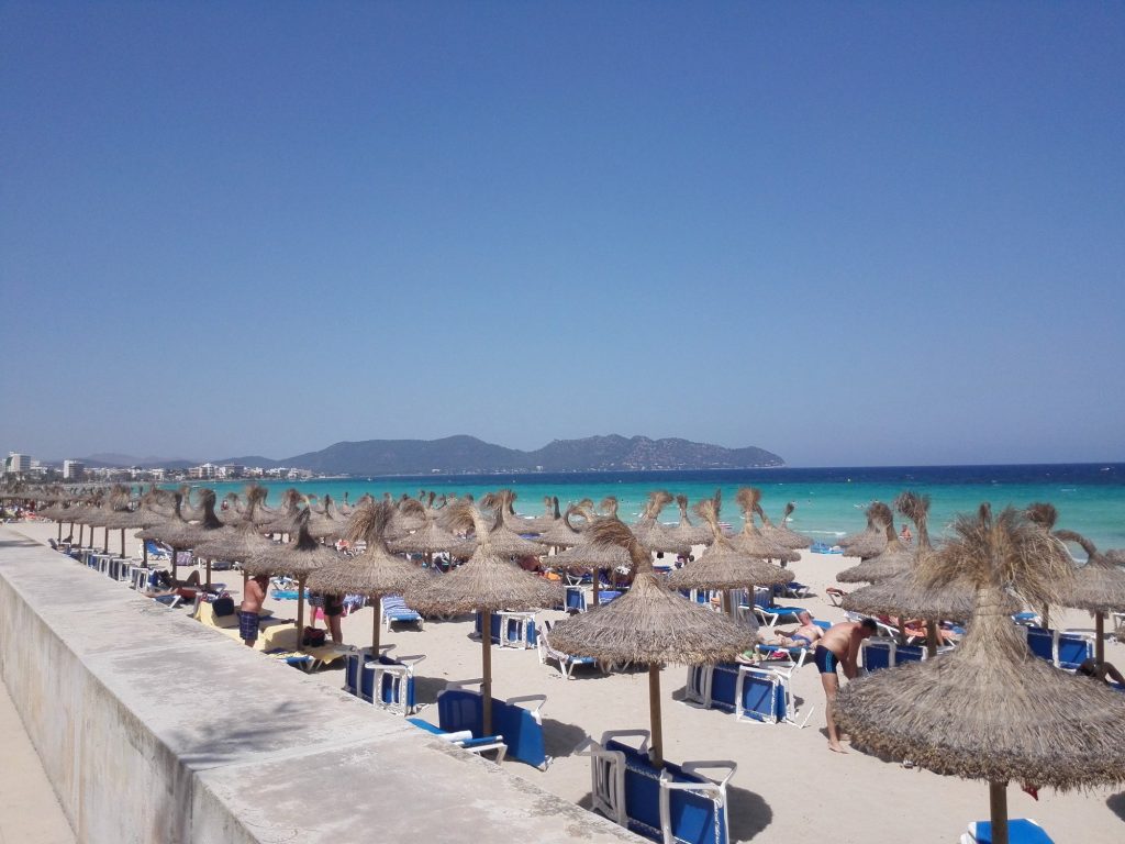 Sa Coma beach in Mallorca, where Gregg Thompson was inspired to create Cleaner Seas Collective.
